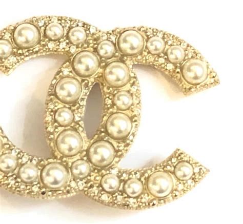 fake chanel crystal logo pin|chanel brooch pearl.